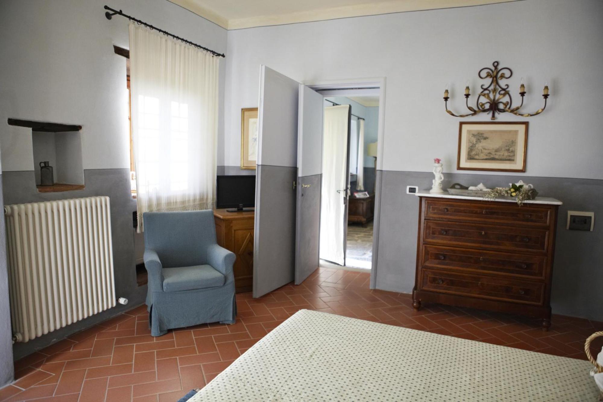 Relais Villa Belpoggio - Residenza D'Epoca Loro Ciuffenna Szoba fotó