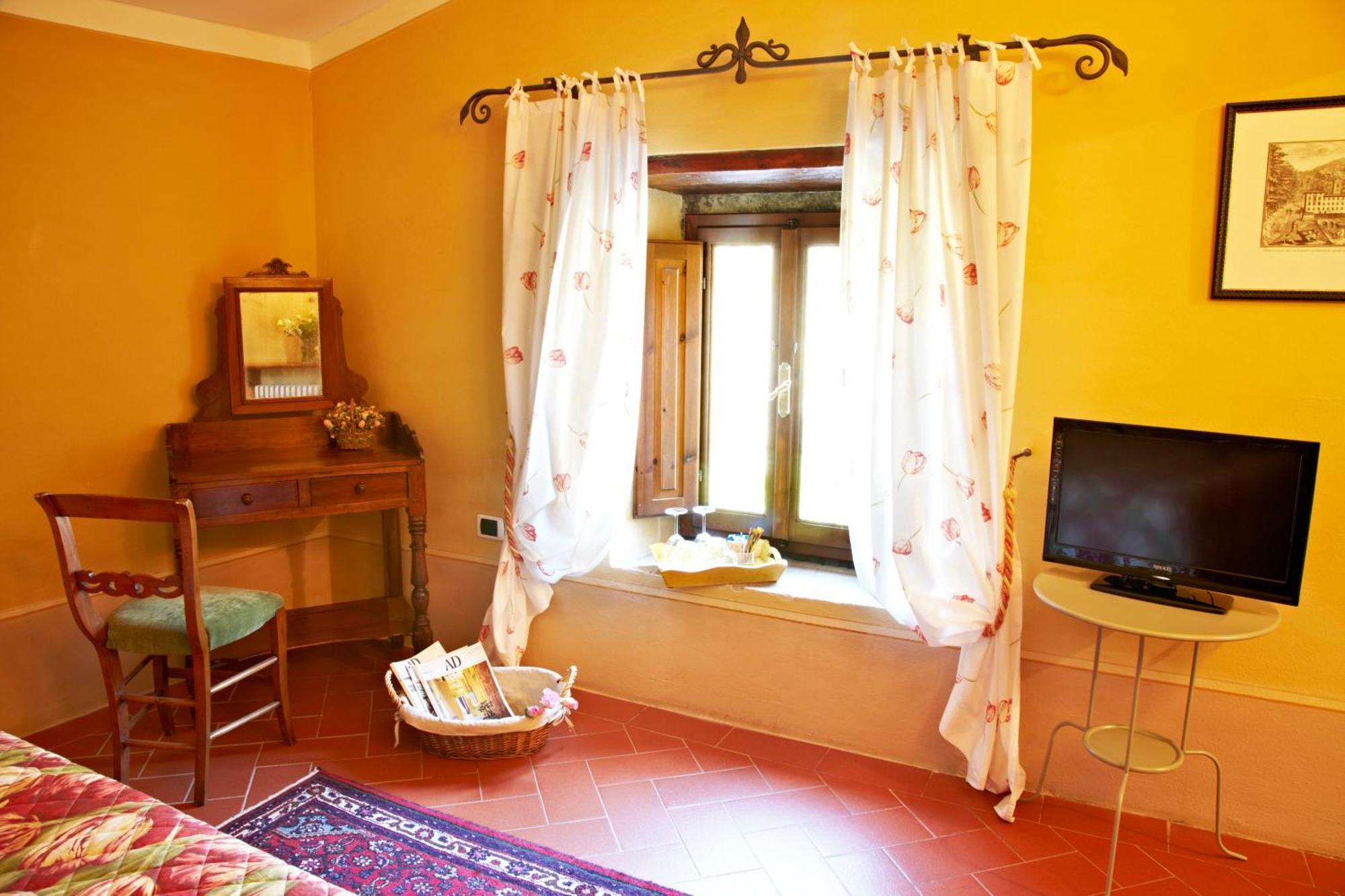 Relais Villa Belpoggio - Residenza D'Epoca Loro Ciuffenna Szoba fotó